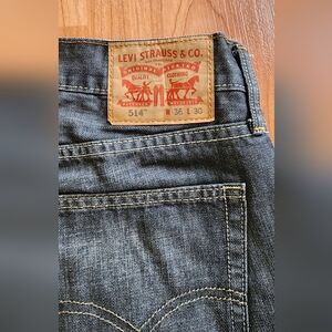 Levi's Straight Men’s Jeans in Dark Indigo with Tan Patch